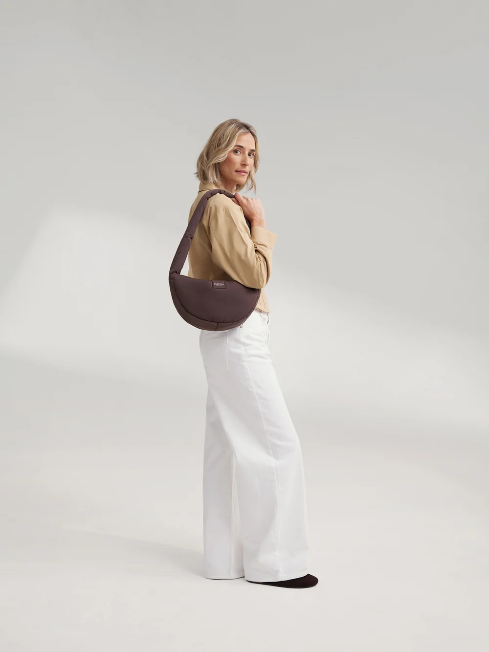 Puffy Mini Cross Body Bag | Brown
